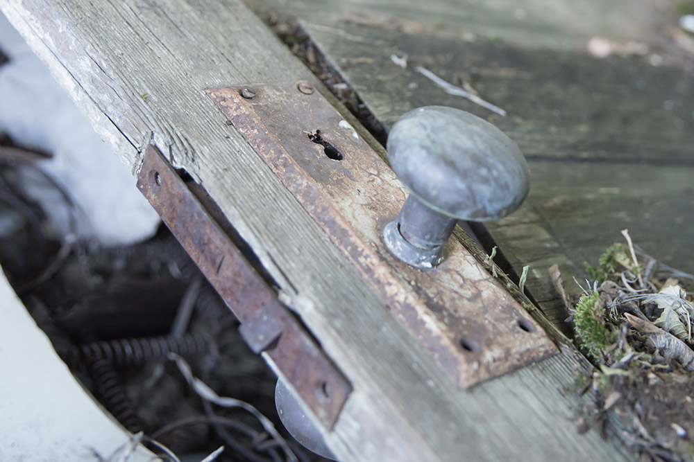 a photo of an old door in an old homestead