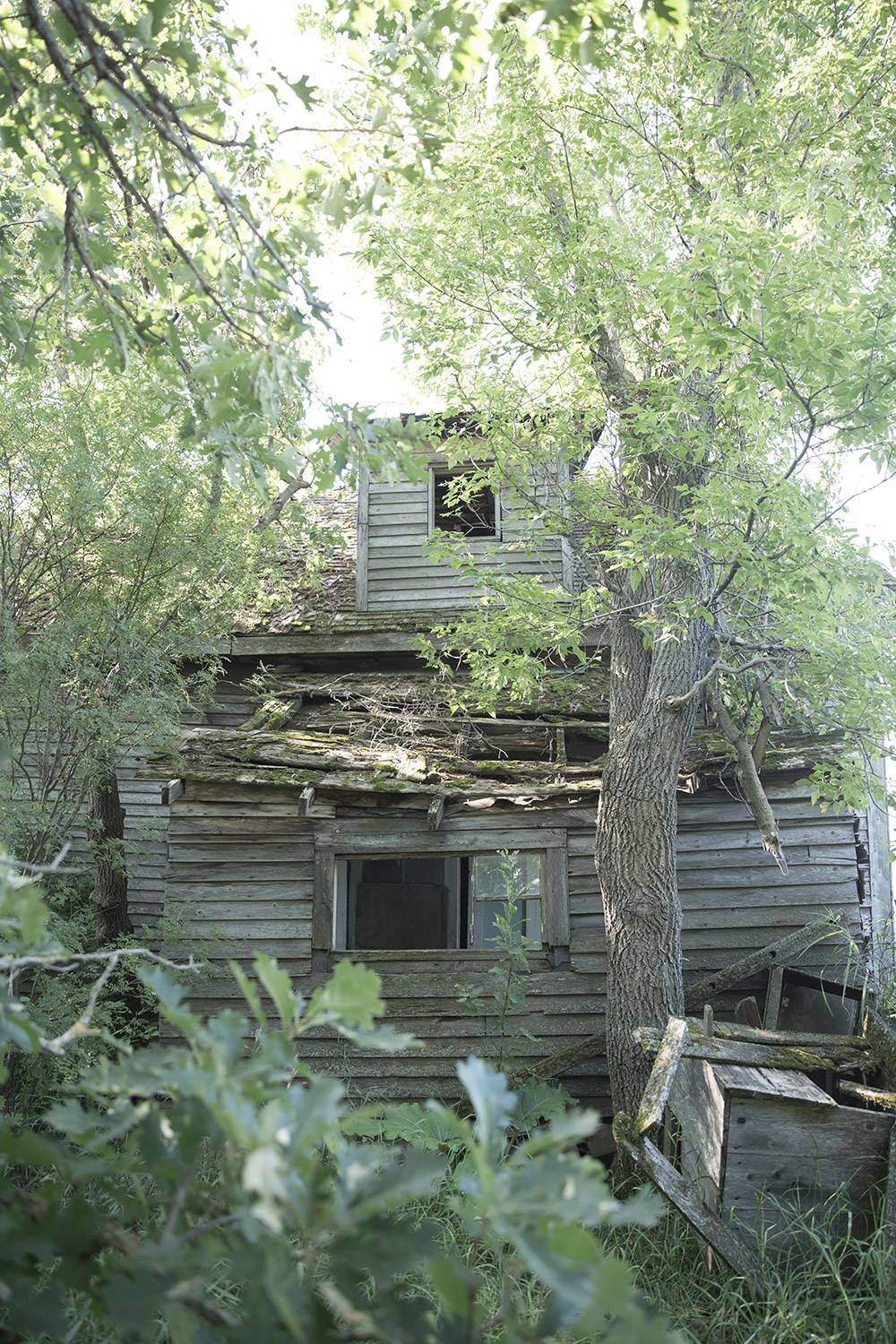 a photo of an abandoned home in Ashville, Manitoba