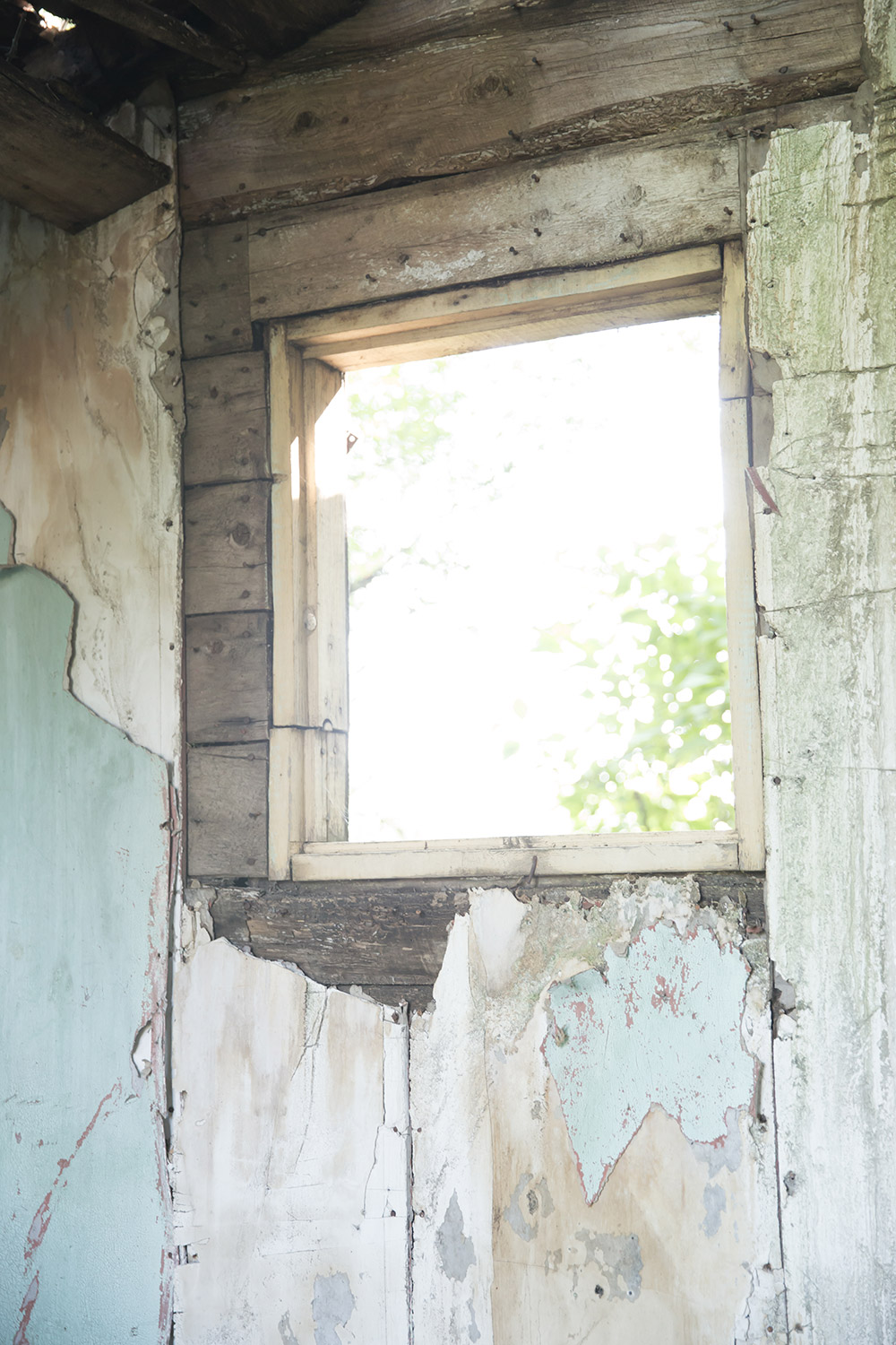 a photo of a window from inside an old home