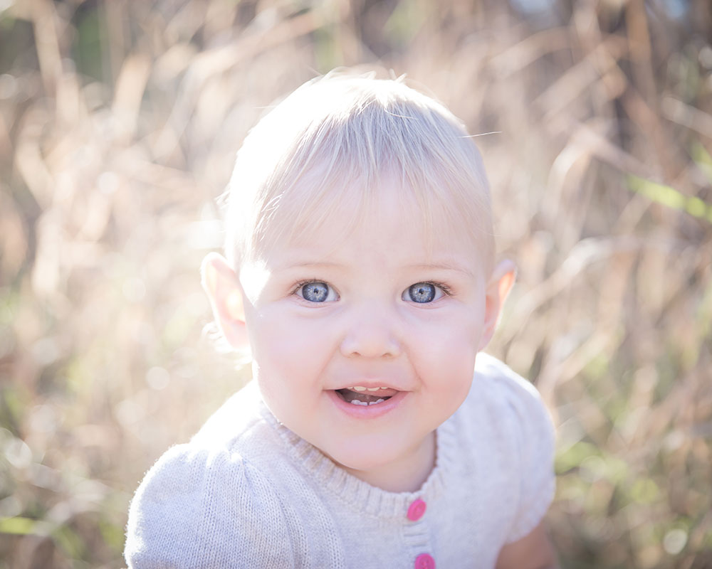 a photo of a little girls with big blue eyes