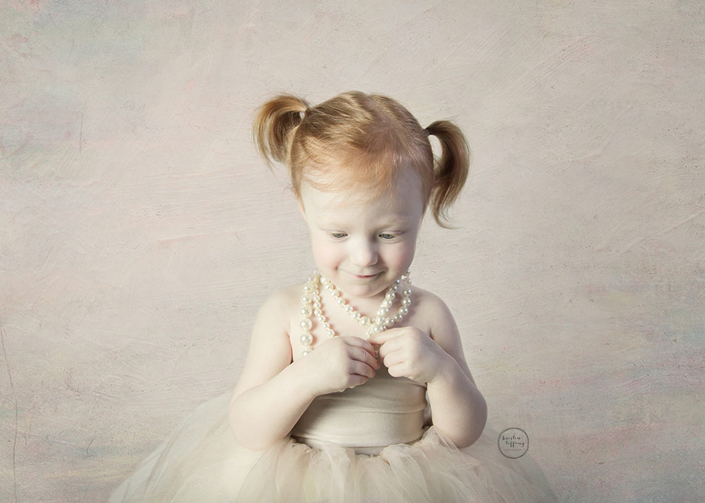 a photo of a little girl in a large tutu
