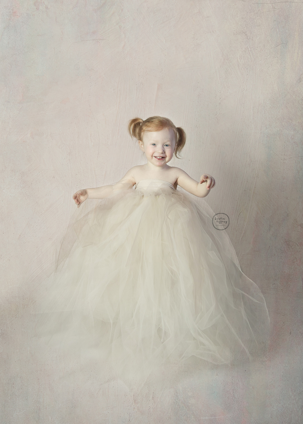 a photo of a little girl in a large tutu