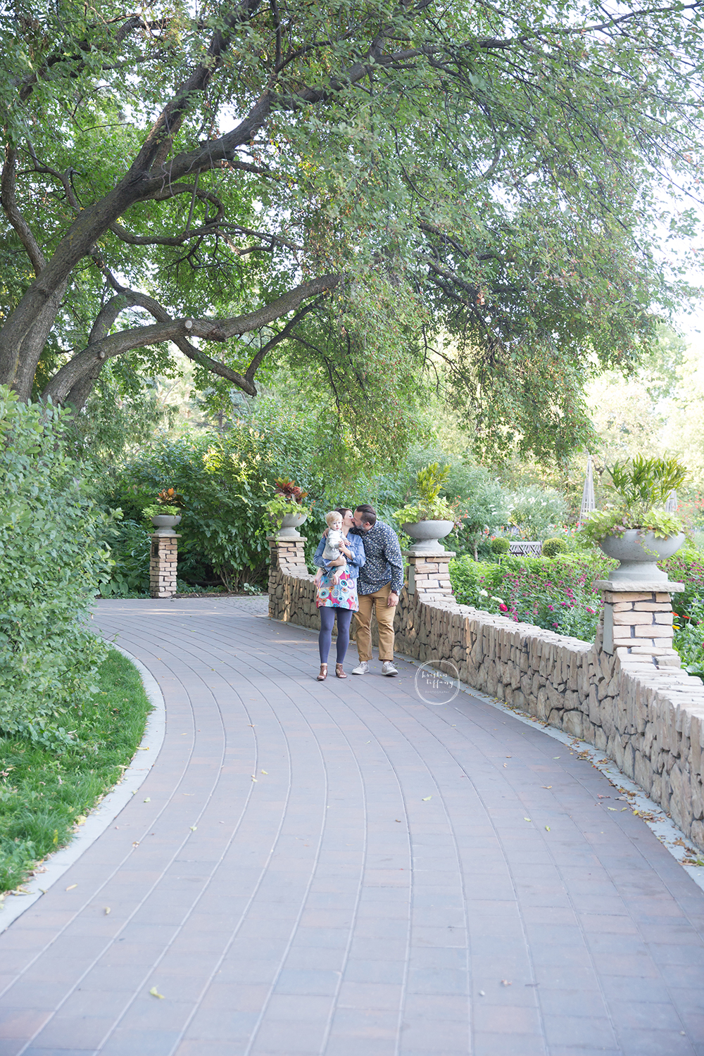 a family photo taken at the English Gardens in Winnipeg
