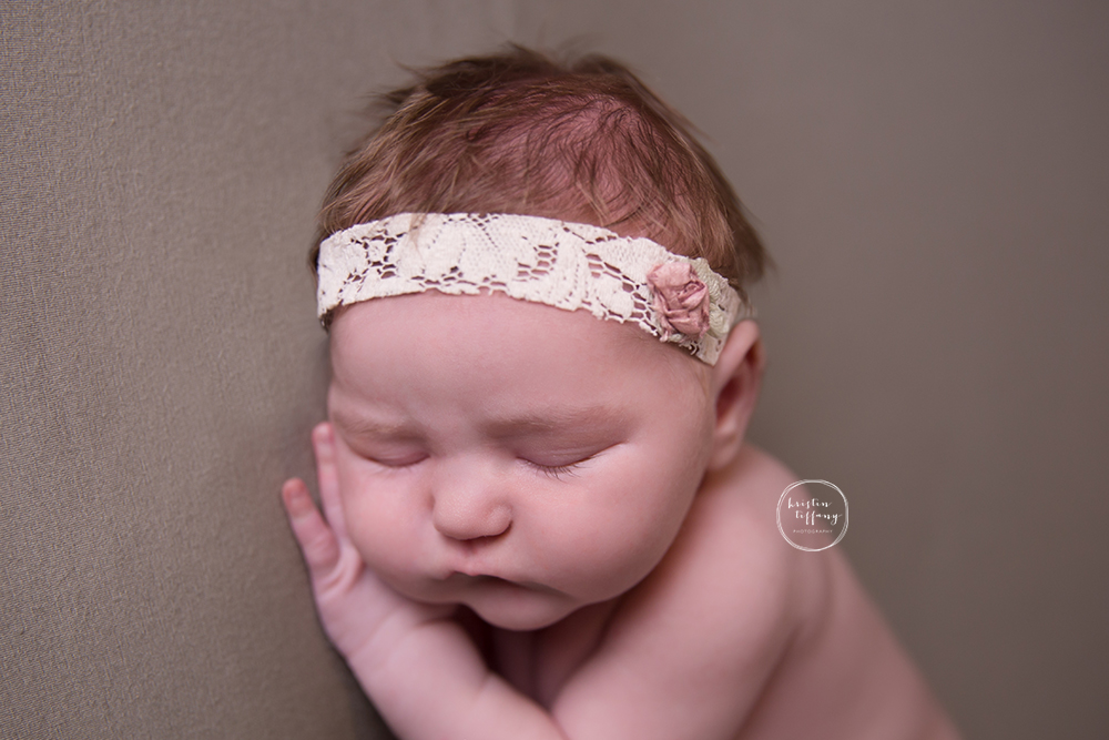 a photo of a newborn baby girl