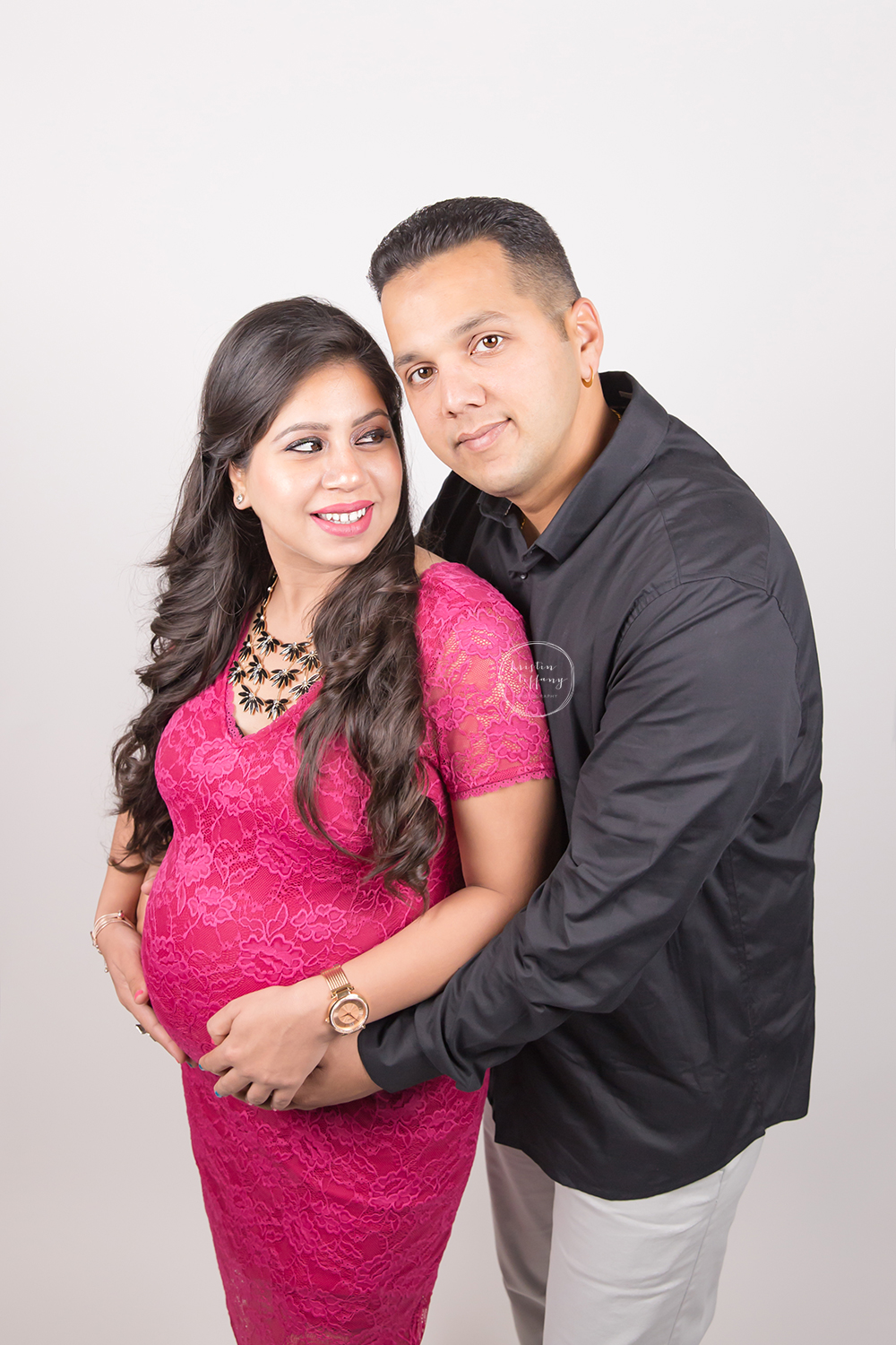 a maternity photo with a couple