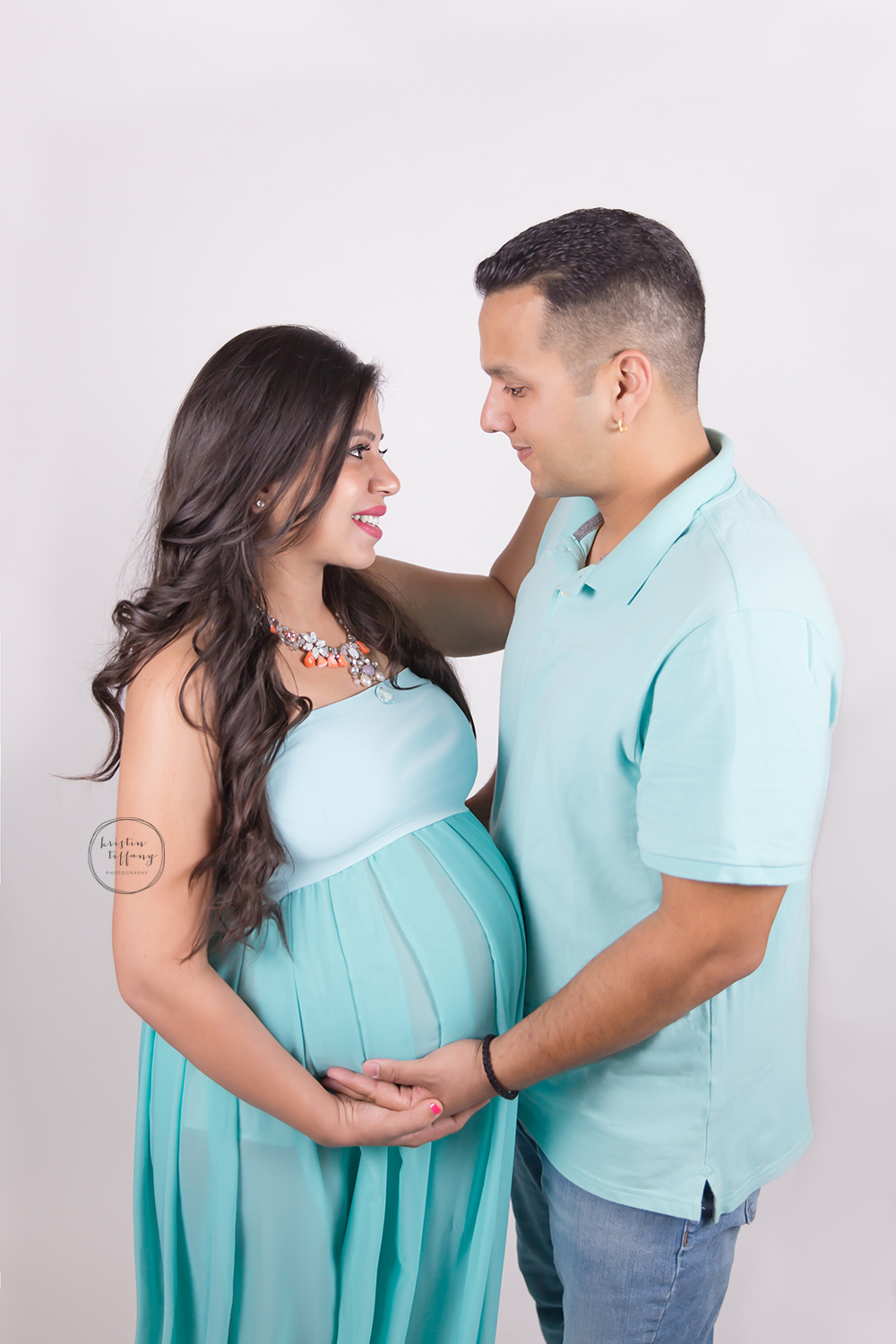 a maternity photo of a couple expecting their first baby
