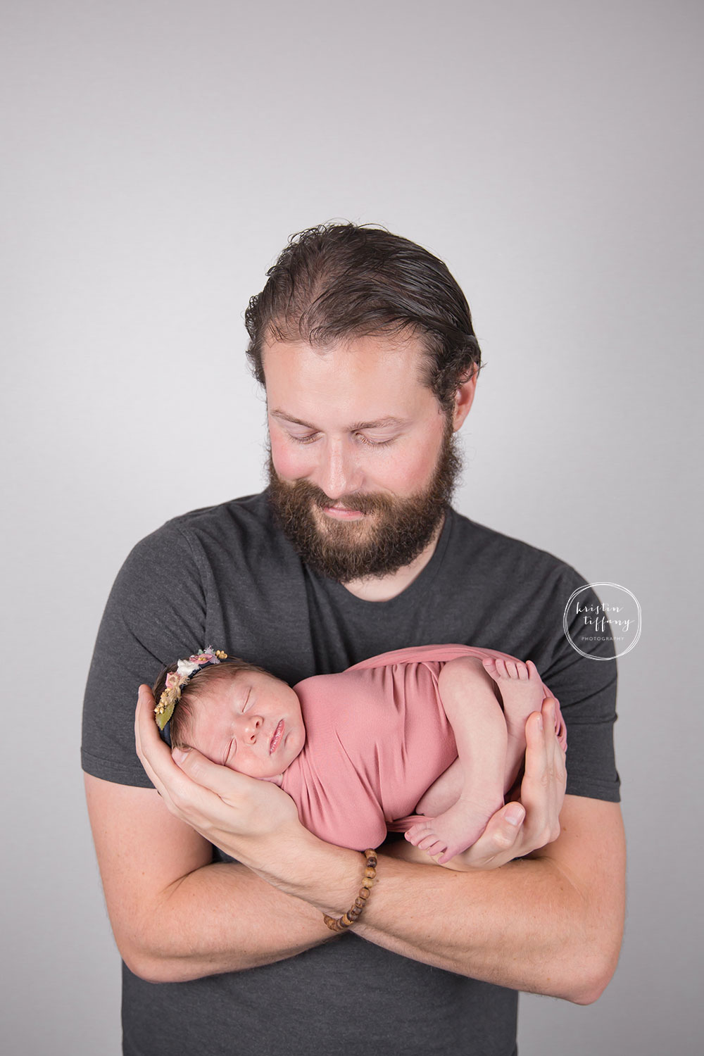 a photo of a baby girl with her dad