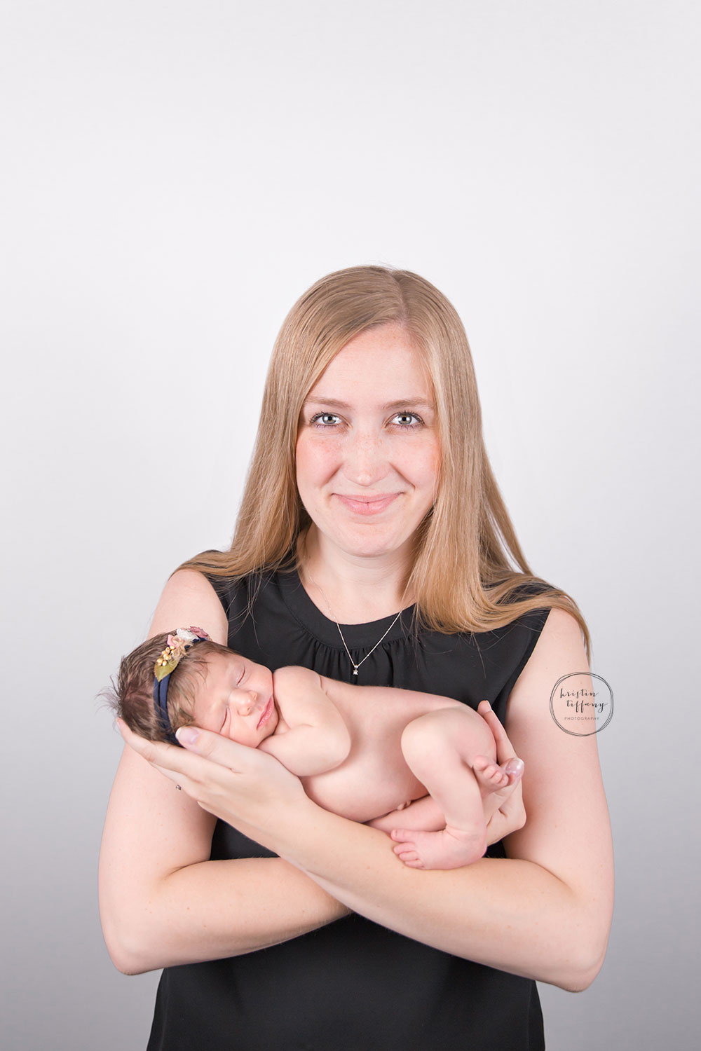a photo of a baby girl with her mom
