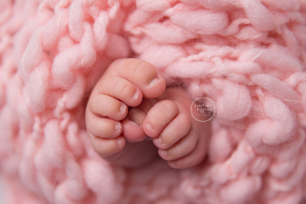 a photo of baby newborn feet