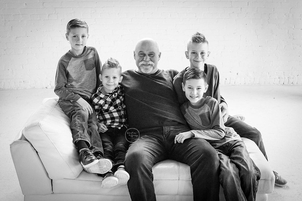 a photo of a grandpa and his grandsons