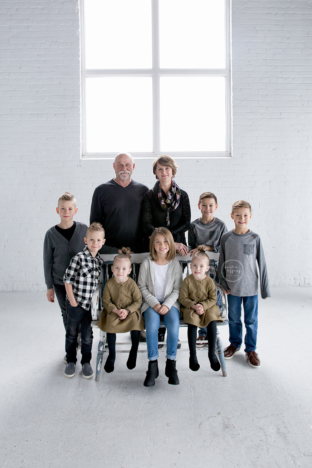 a photo of grandparents with their grandchildren