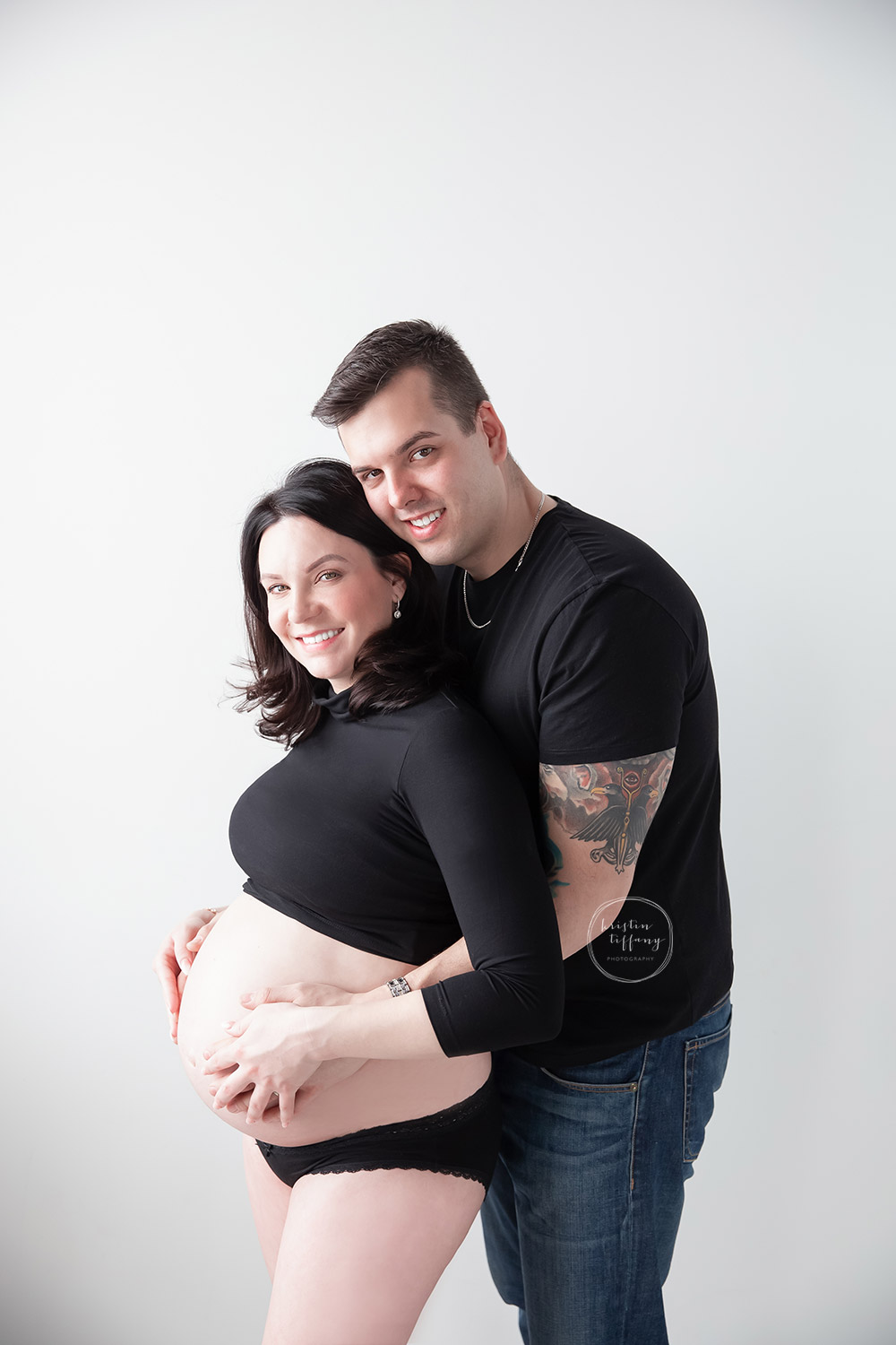 a maternity photo of an expectant couple