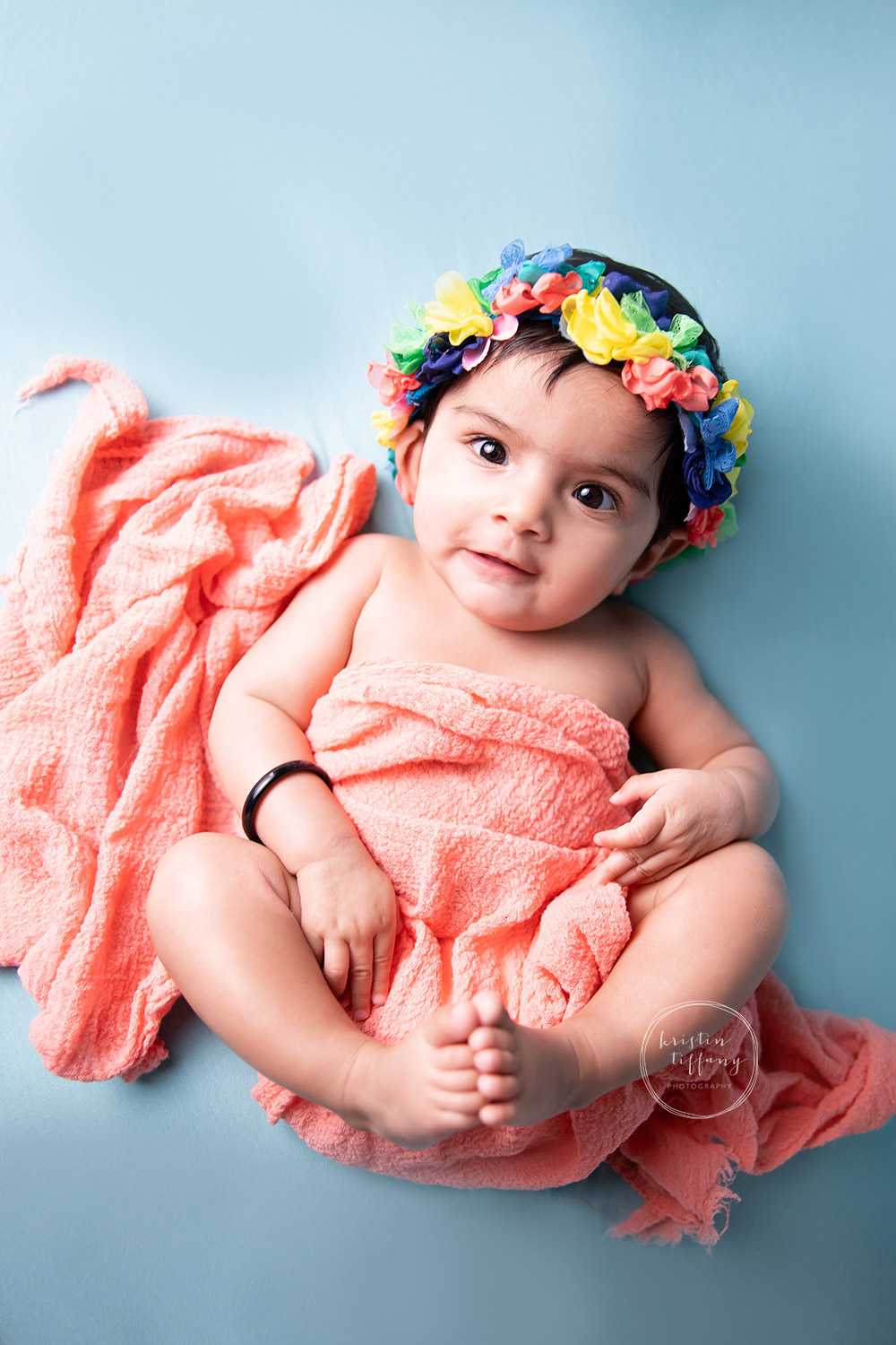 a photo of a baby girl at her photoshoot