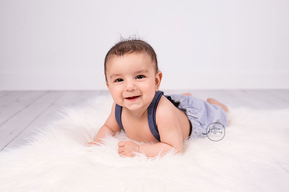 a photo of a baby boy at his photo shoot
