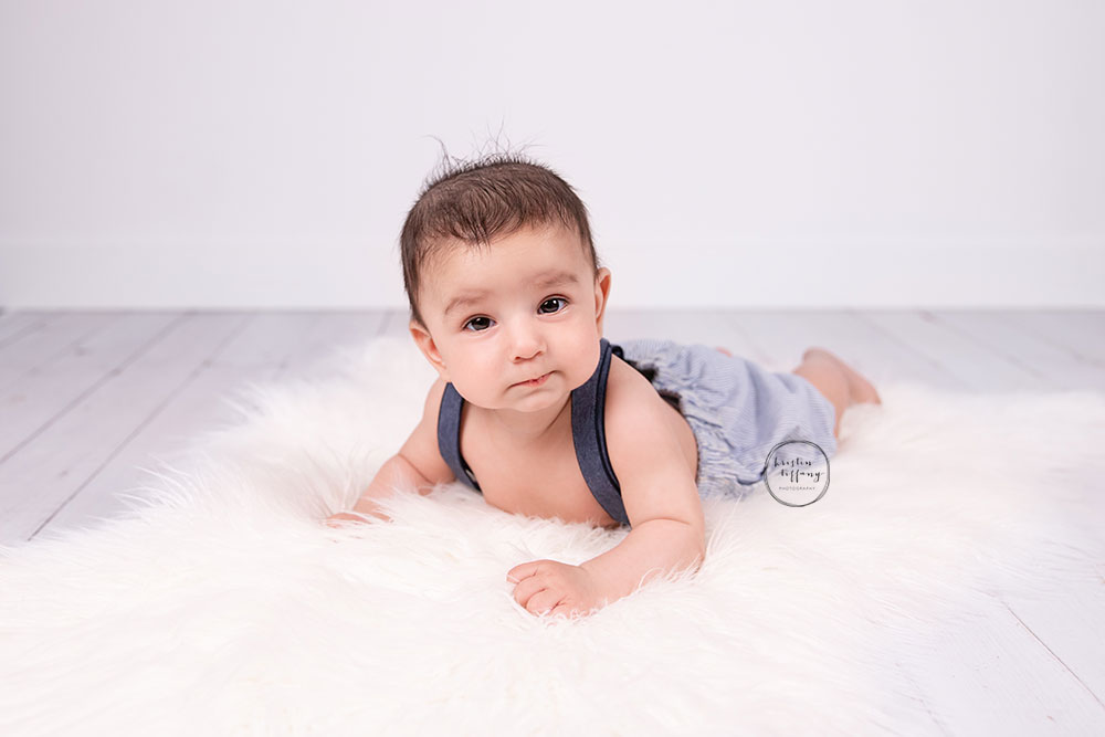 a photo of a baby boy at his photo shoot