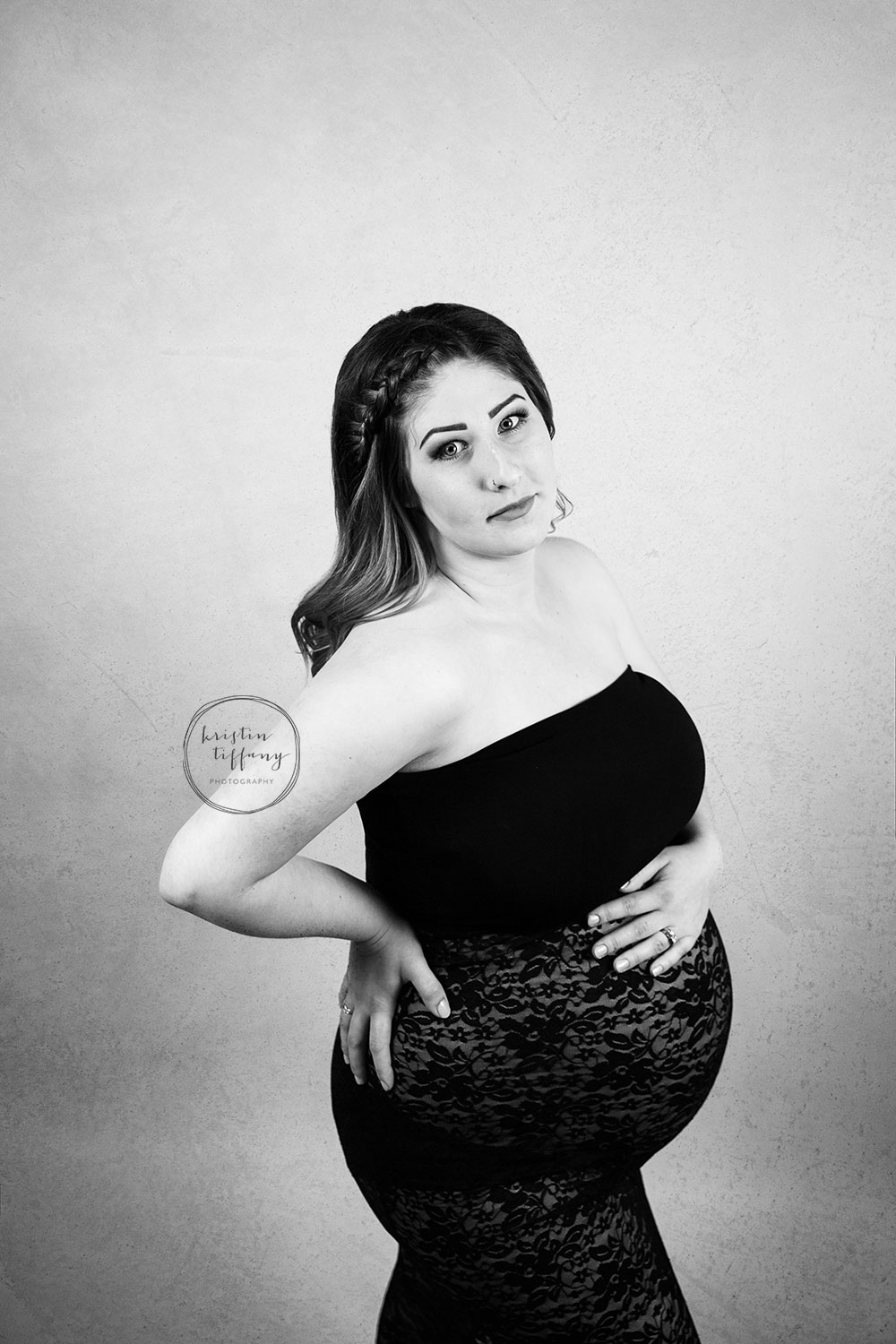 a photo of a pregnant woman at her maternity photo shoot