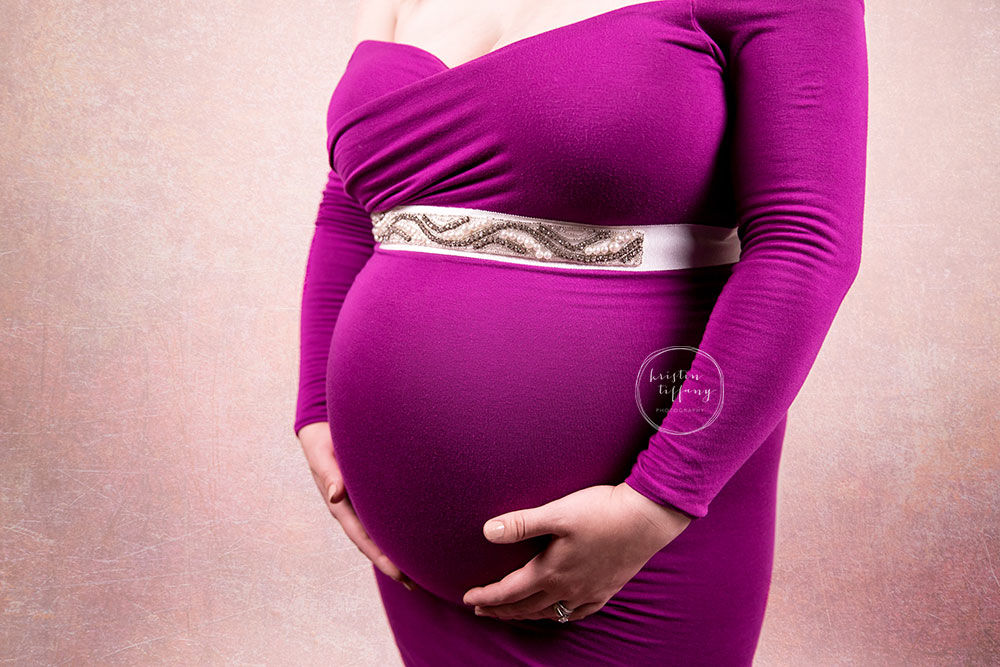 a photo of a pregnant woman at her maternity photo shoot