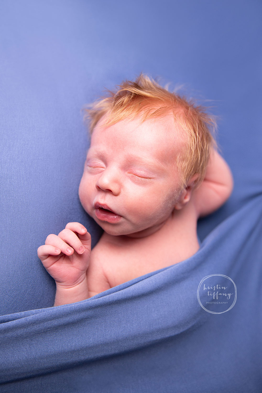 a photo of baby boy at his newborn photo session