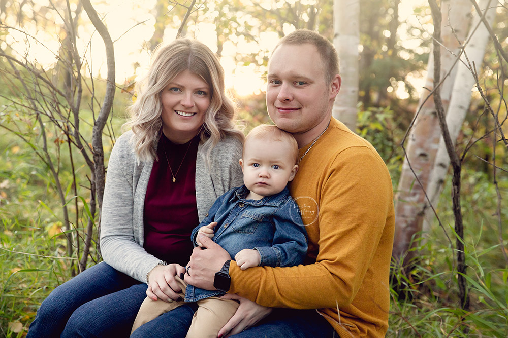 a photo of a family at an outdoor fall photo session