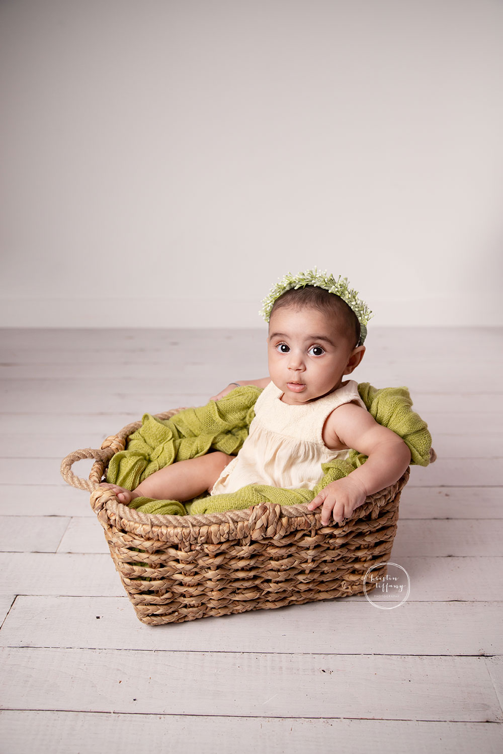 a photo of a baby girl at her photo shoot