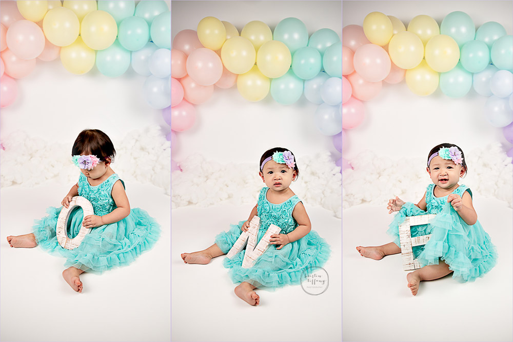a photo of a baby girl at her cake smash photoshoot