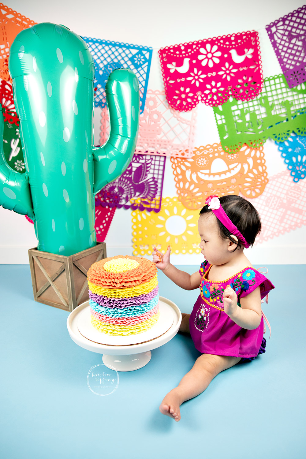 a photo from a cake smash session with Kristin Tiffany Photography