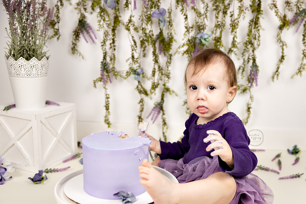 a photo from a cake smash session with Kristin Tiffany Photography in Winnipeg