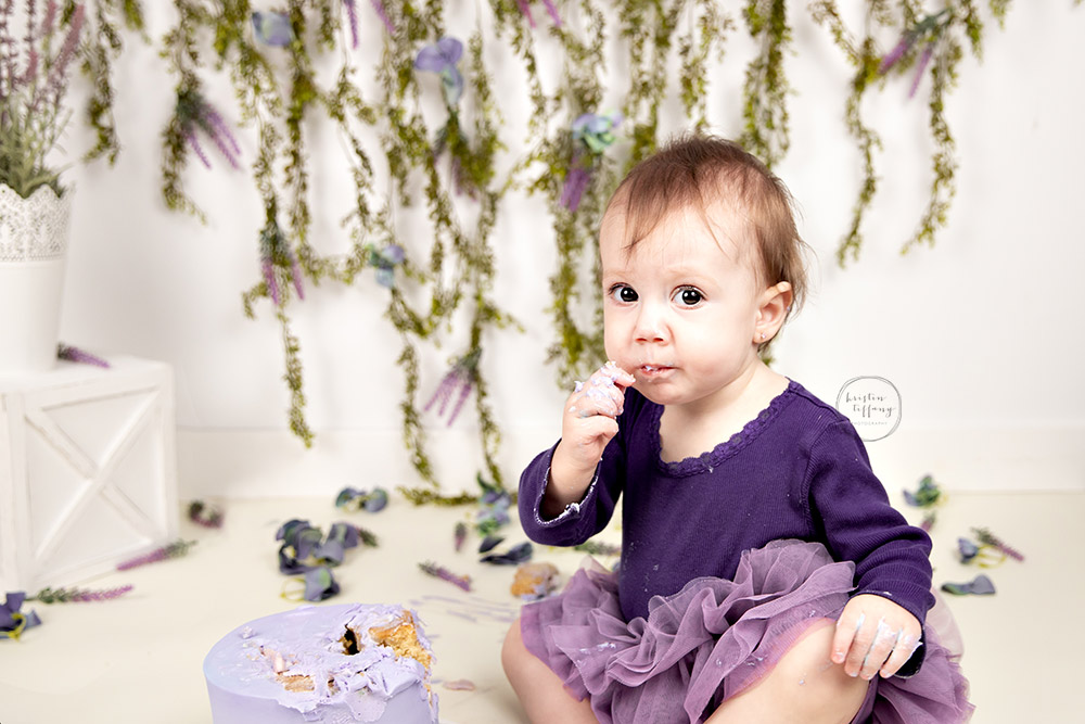 a photo from a cake smash session with Kristin Tiffany Photography in Winnipeg