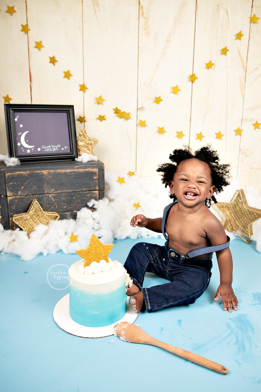 a photo of a baby boy at a cake smash session with Kristin Tiffany Photography
