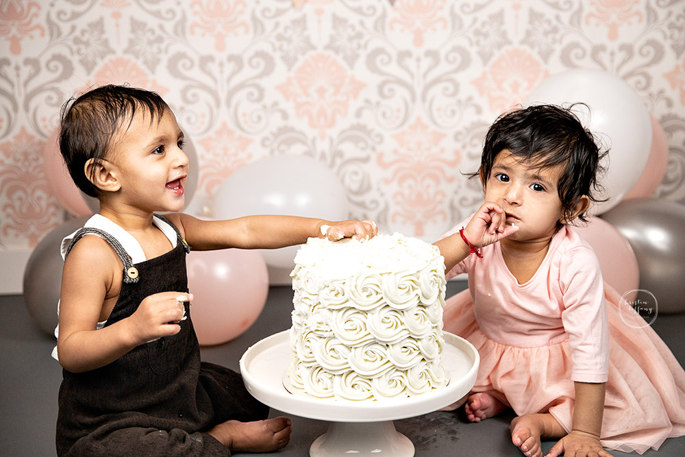 a photo from a twin Cake Smash Session with Kristin Tiffany Photography