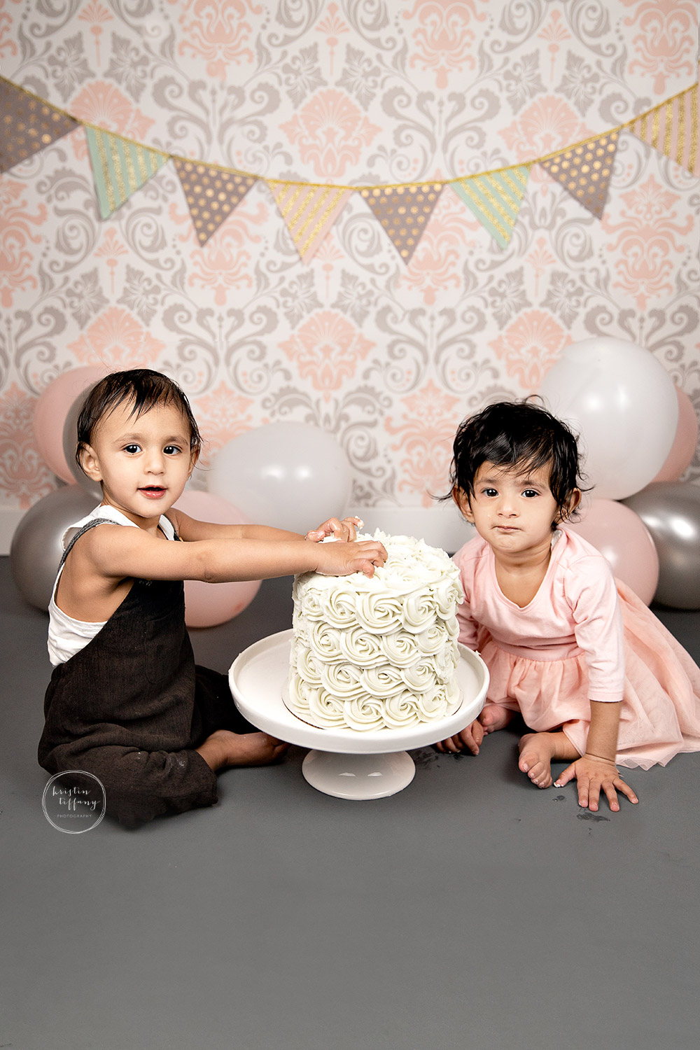 a photo from a twin Cake Smash Session with Kristin Tiffany Photography