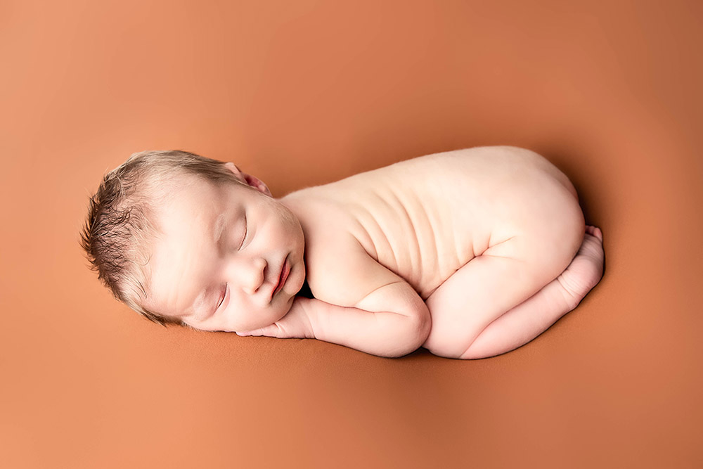 a newborn photo by Kristin Tiffany Photography