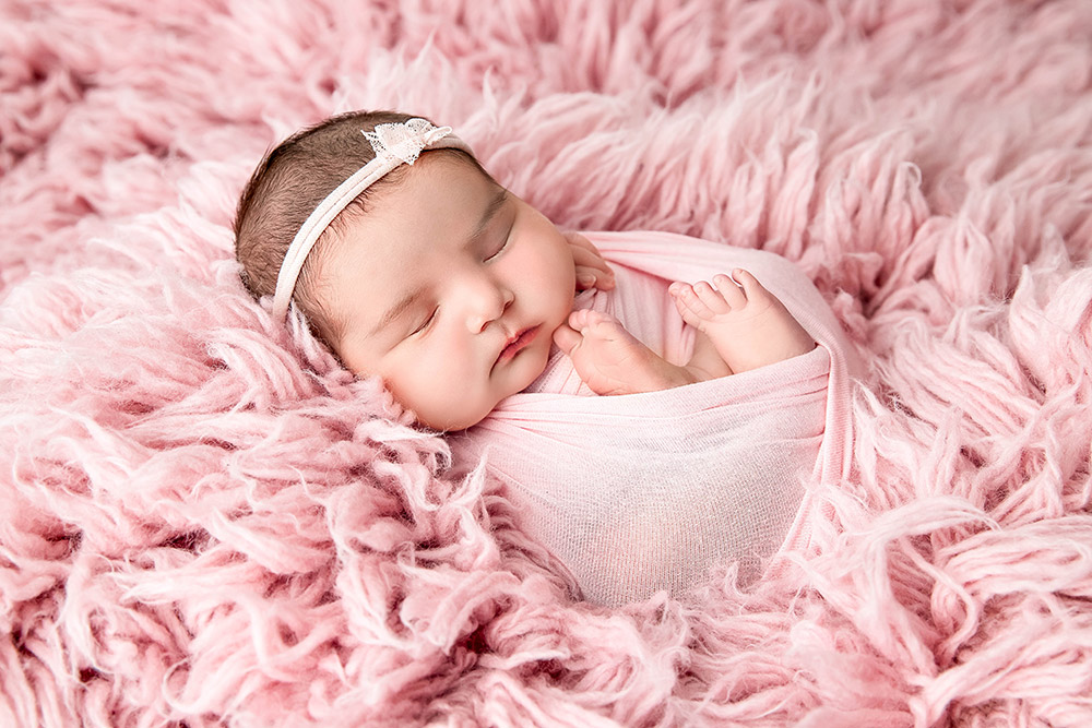 a newborn photo by Kristin Tiffany Photography